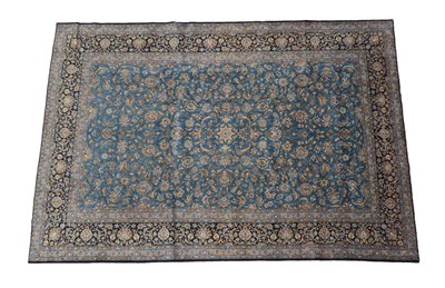 Lot 256 - Kashan Carpet Central Iran, circa 1965 The mid indigo field of vines enclosed by deep indigo...