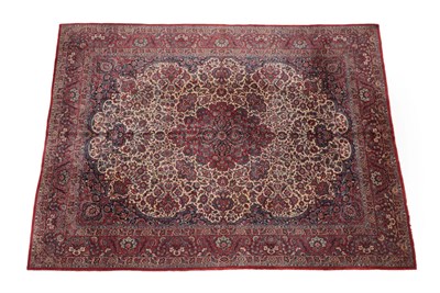 Lot 262 - Fine Kashan Carpet Central Iran, circa 1930 The ivory field of flowering plants and vines...