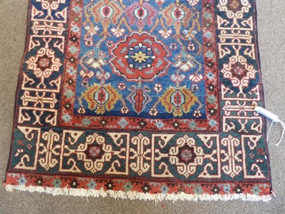 Lot 263 - Kurdish Runner Iranian Kurdistan, circa 1910 The midnight blue field with columns of polychrome...