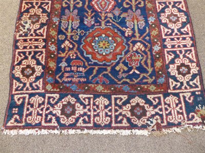 Lot 263 - Kurdish Runner Iranian Kurdistan, circa 1910 The midnight blue field with columns of polychrome...