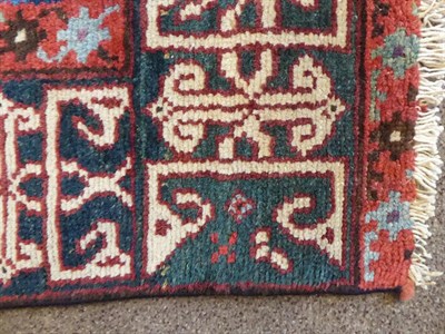Lot 263 - Kurdish Runner Iranian Kurdistan, circa 1910 The midnight blue field with columns of polychrome...