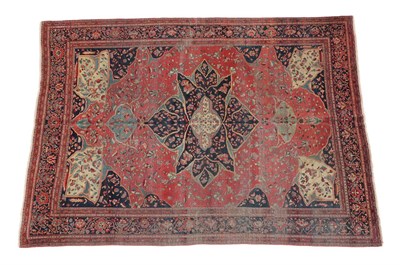 Lot 264 - Good Saroukh Carpet West Iran, circa 1910 The tomato red field of angular vines around an...