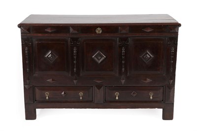 Lot 269 - A 17th Century Joined Oak Chest, the hinged lid enclosing a candle box above four moulded...