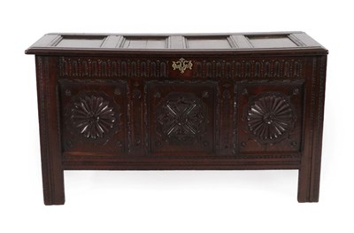 Lot 270 - A Mid 17th Century Joined Oak Chest, the hinged lid with four moulded panels above a nulled...