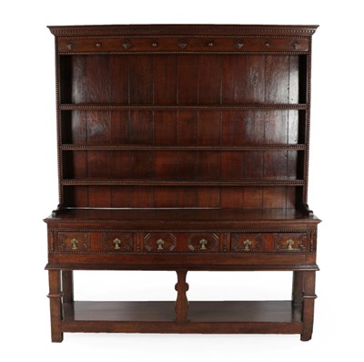 Lot 278 - A Late 17th Century Oak Dresser and Rack, the upper section with dentil cornice and gadrooned...