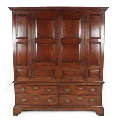 Lot 283 - An 18th Century Joined Oak Press Cupboard, with Greek Key dentil cornice above two cupboard...