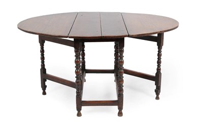 Lot 285 - A Joined Oak Six-Seater Dropleaf Dining Table, circa 1700, with baluster bobbin turned legs...