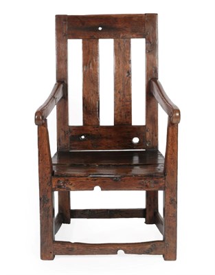 Lot 294 - A 19th Century Joined Oak Armchair, possibly Isle of Man, the back support with two vertical splats