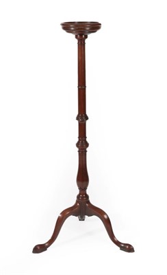 Lot 308 - A George III Mahogany Candle Stand, 3rd quarter 18th century, the circular top above a baluster and