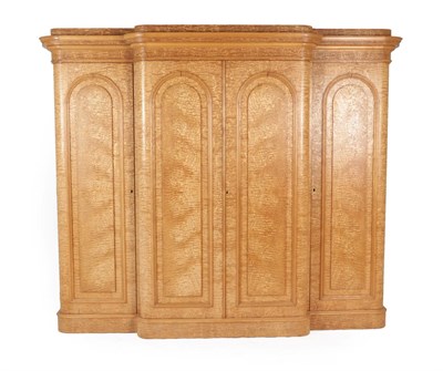 Lot 320 - A Victorian Burr Ash Breakfront Wardrobe, circa 1870, the moulded cornice above four moulded...