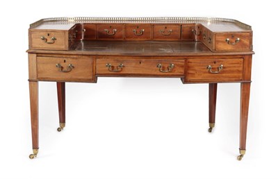 Lot 323 - A Late George III Mahogany Carlton House Desk, early 19th century, of large proportions, with...