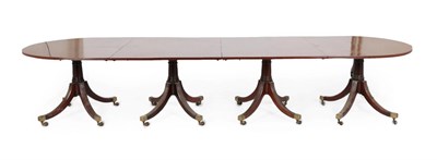 Lot 331 - A George III Style Mahogany Four-Pillar Dining Table, comprising two D end sections and two...