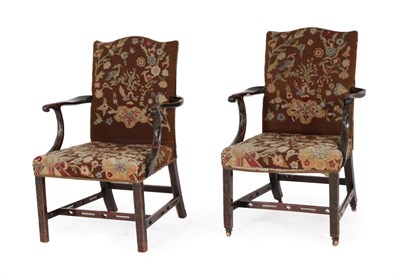 Lot 346 - A Pair of George III Mahogany Gainsborough Style Library Armchairs, late 18th century, recovered in