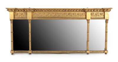 Lot 379 - A Regency Gilt and Gesso Triptych Overmantel Mirror, early 19th century, of breakfront form...