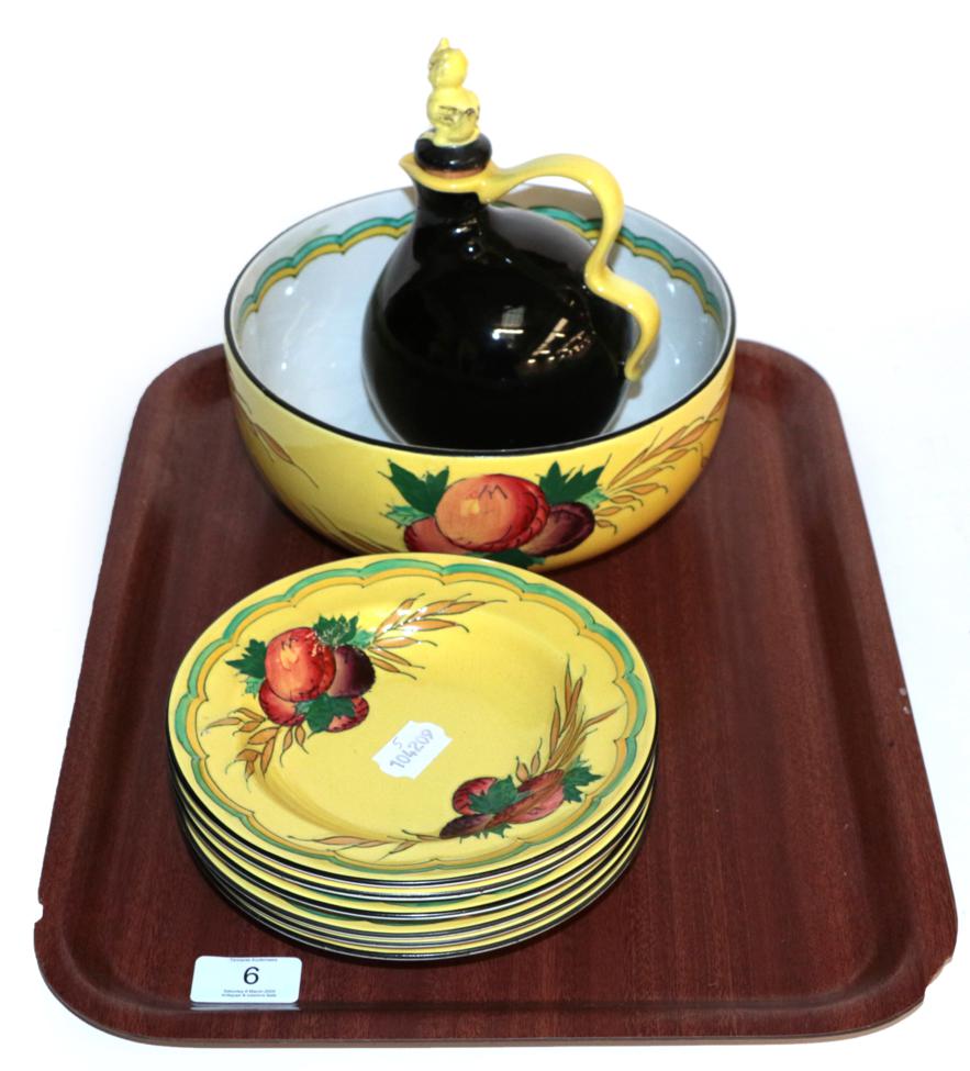 Lot 6 - A large Mintons Secessionist fruit bowl, tubelined fruit and foliate sprays on yellow ground,...