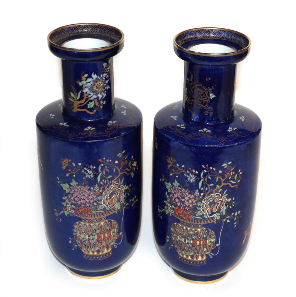 Lot 13 - A pair of Wiltshaw & Robinson Carlton Ware rouleau vases, circa 1920's, decorated with gilt...
