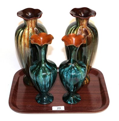 Lot 20 - A pair of Linthorpe pottery vases, shape 998, both with retailers label 'Dickinson & Benson...
