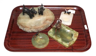 Lot 33 - Three bronze mounted onyx dishes and a spelter terrier mounted ashtray (4)