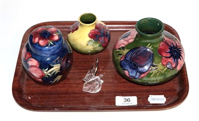 Lot 36 - Walter Moorcroft pottery: an Anemone pattern vase, Anemone pattern ginger jar and cover, and a...