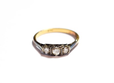 Lot 61 - A diamond three stone ring, stamped '18CT, finger size Q