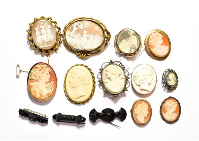 Lot 68 - A collection of cameo brooches (some in 9 carat gold frames); three jet brooches etc