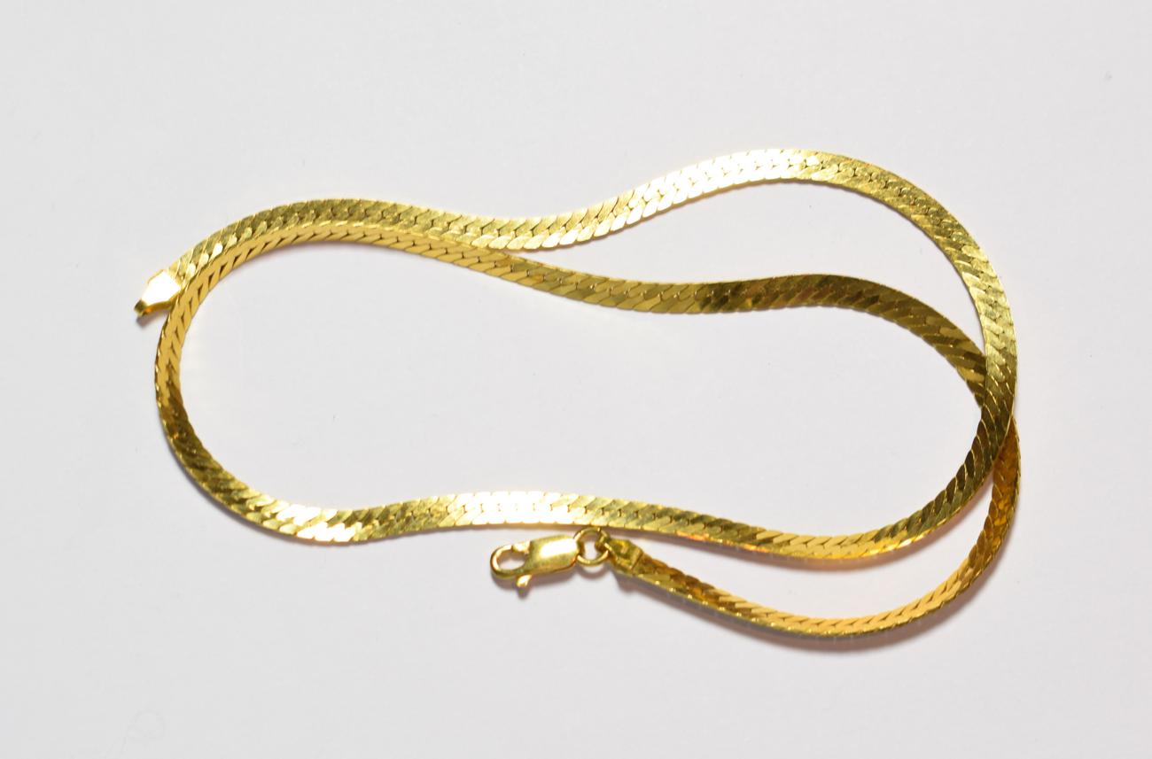 Lot 70 - A herringbone link necklace, stamped '750', length 46cm