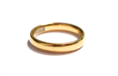 Lot 75 - An 18 carat gold band ring, finger size P