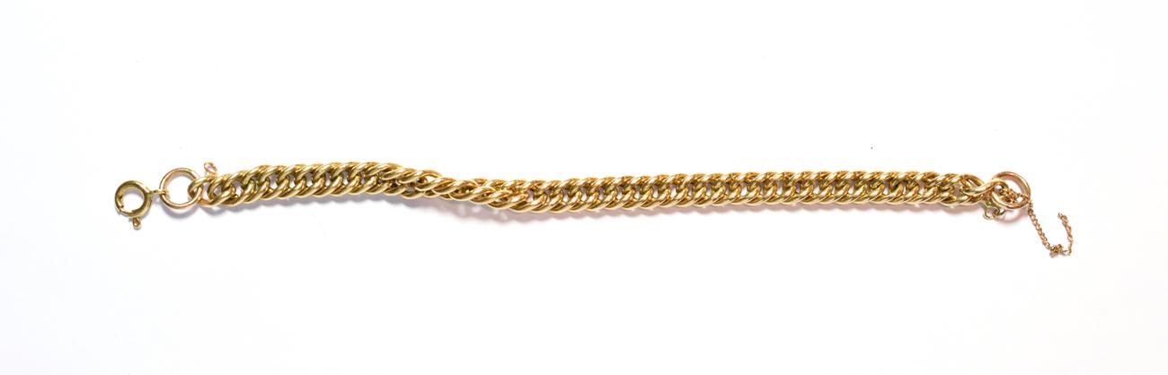 Lot 89 - A curb link bracelet, with applied plaque stamped '375', length 20cm