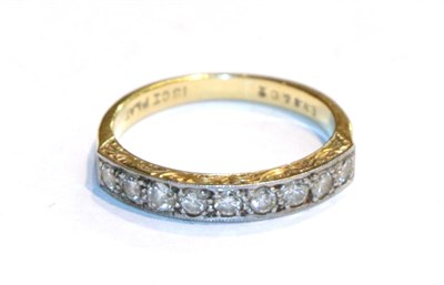Lot 93 - A diamond nine stone ring, stamped '18CT & PLAT', finger size P