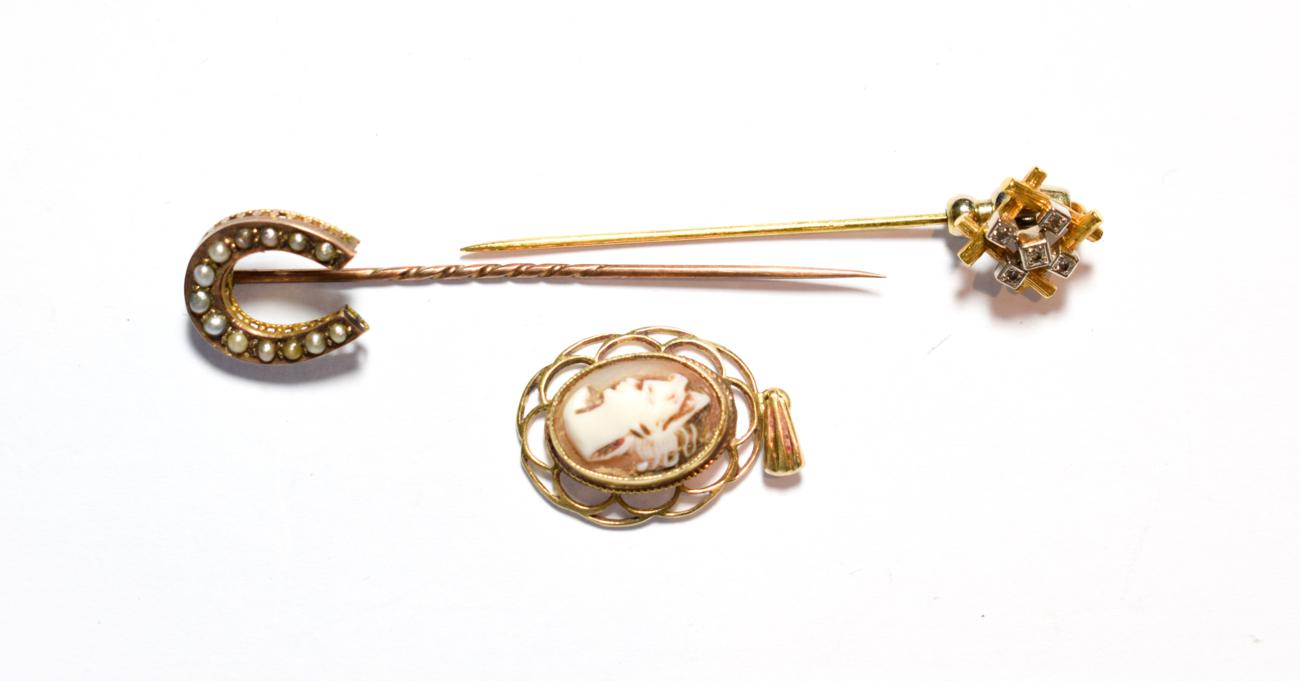 Lot 96 - An 18 carat gold diamond set stick pin; a seed pearl horseshoe stick pin; and a cameo pendant,...