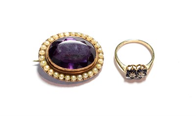 Lot 98 - An amethyst and seed pearl brooch, unmarked, length 3.3cm; and a 9 carat gold sapphire and...