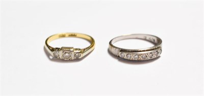 Lot 103 - A diamond seven stone ring, stamped 'PLT', finger size P; and a diamond three stone ring,...