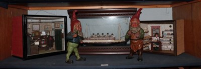 Lot 121 - A model of a ocean cruise ship in a glazed cabinet; a display case depicting an artist's...