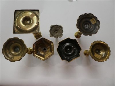 Lot 134 - A large collection of brass candlesticks