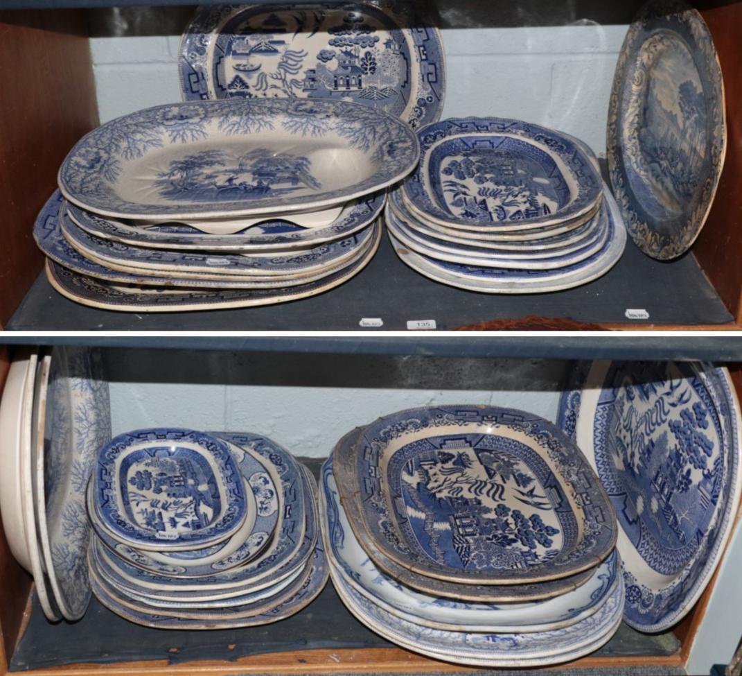 Lot 135 - A large quantity of transfer printed blue and white Staffordshire meat plates (a.f.) (two shelves)