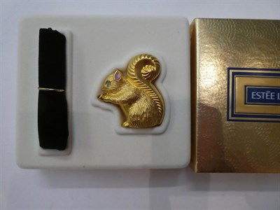 Lot 145 - Four assorted Estée Lauder solid perfume compacts, comprising 'Koala Bear'; 'Puppies'; 'Squirrel'