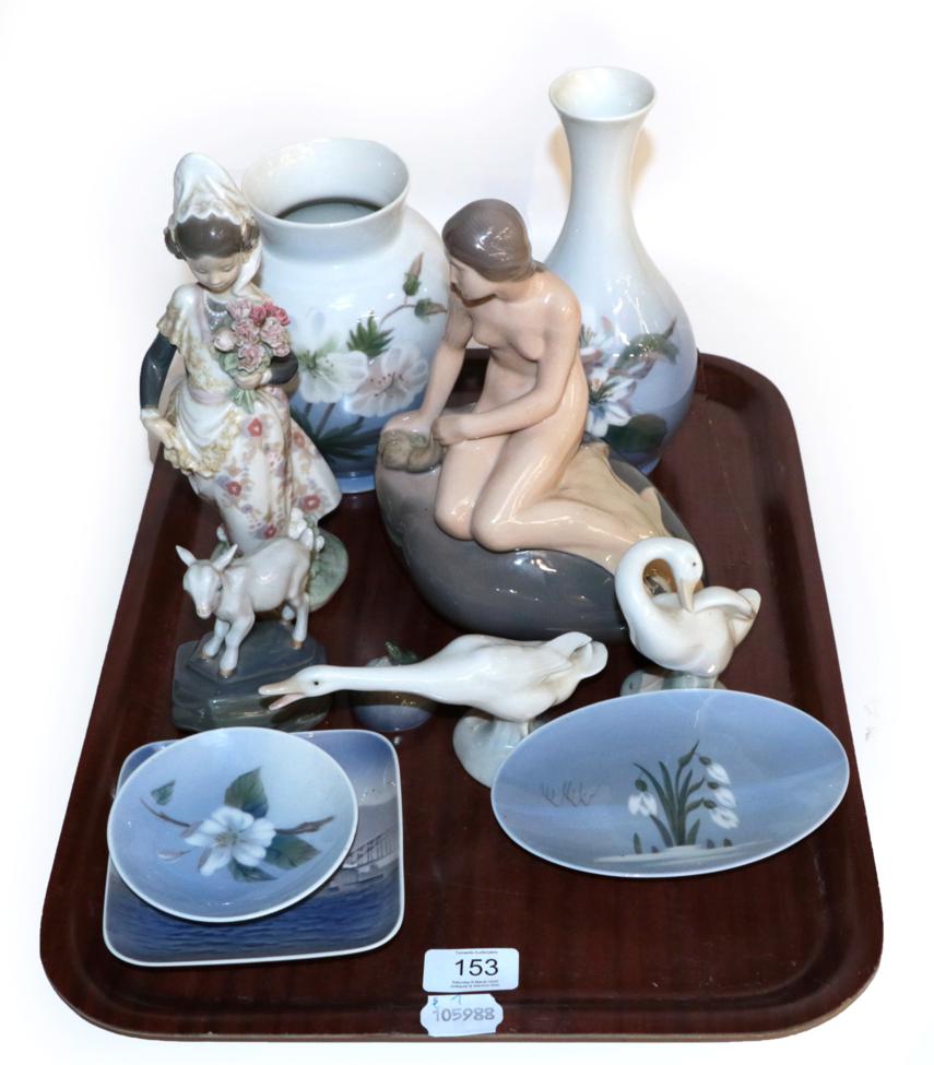 Lot 153 - A tray including assorted Royal Copenhagen figures and vases; together with a Lladro figure of...