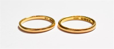 Lot 171 - Two 22 carat gold band rings, finger sizes L and M