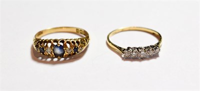 Lot 174 - A diamond five stone ring, stamped '18CT', finger size Q; and an 18 carat gold sapphire and diamond