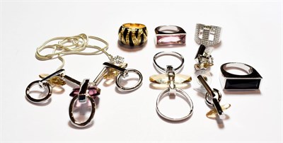 Lot 189 - A Swarovski necklace, earring and ring suite; together with four rings, various styles and sizes