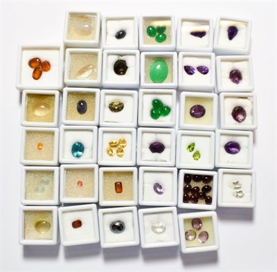 Lot 199 - A quantity of loose gemstones including amethyst, peridot, garnet, rock crystal, haematite,...
