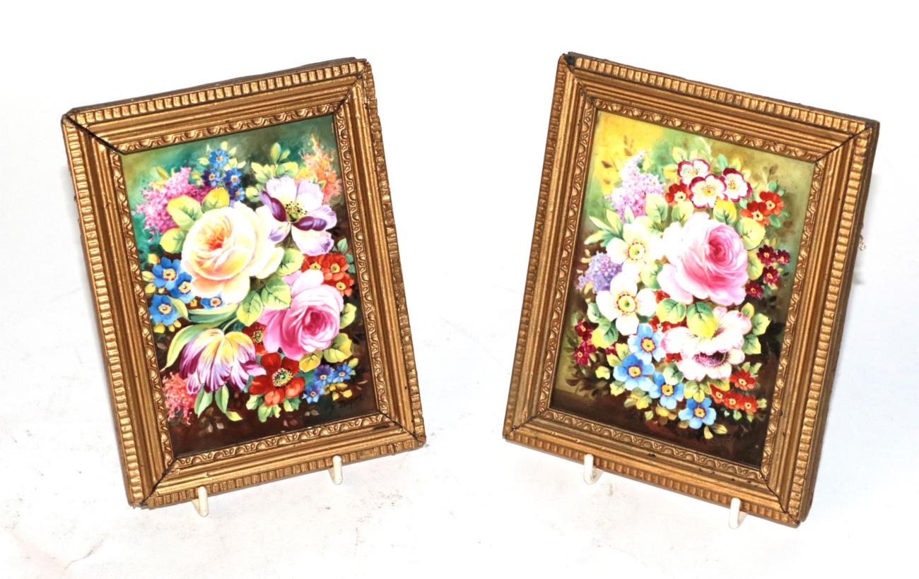 Lot 205 - A pair of English painted porcelain plaques floral sprays, one signed F. James (2)