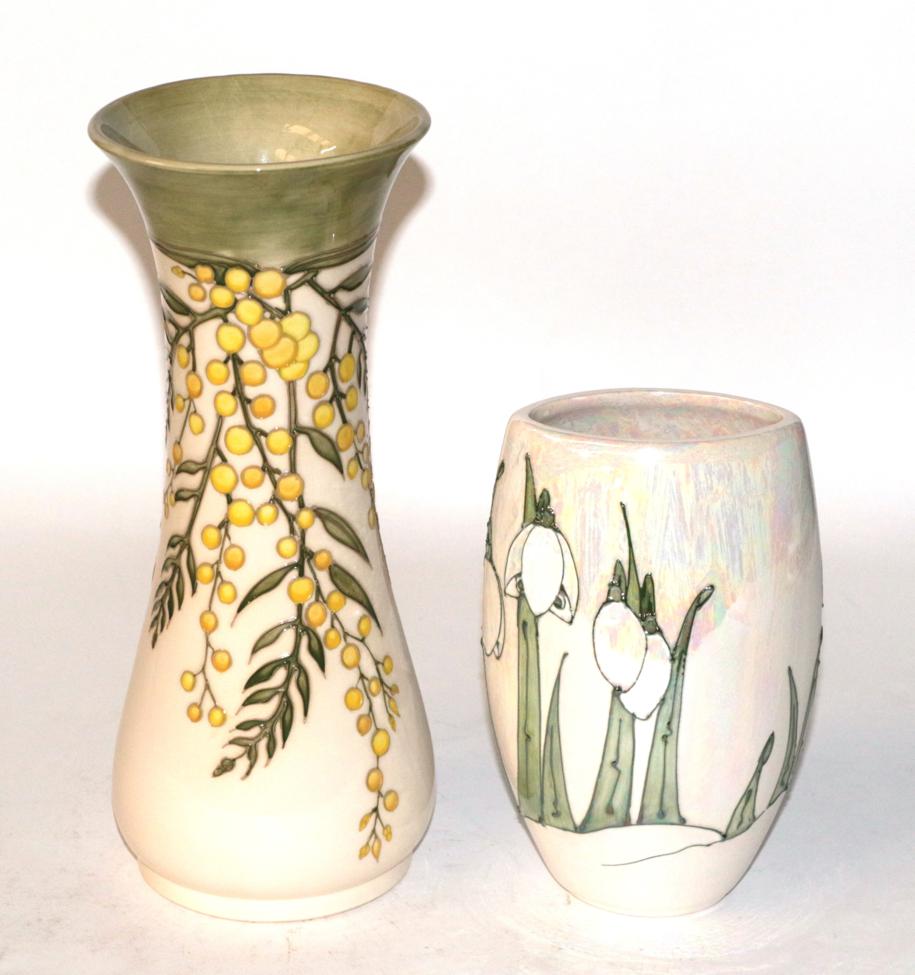 Lot 207 - A Moorcroft pottery vase, 'Mimosa' pattern by Sally Tuffin, 31cm high; and another Moorcroft lustre