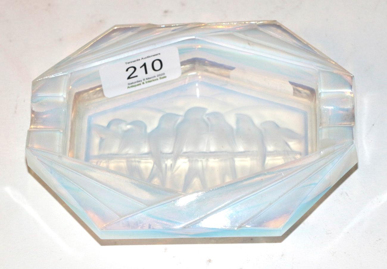 Lot 210 - An Etling opalescent ashtray, of octagonal form, moulded with swallows perched in a line, 15cm wide