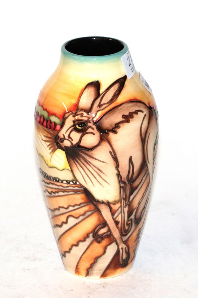 Lot 213 - A Moorcroft pottery vase by Kerry Goodwin, Running Hare pattern for RSPB; limited edition...