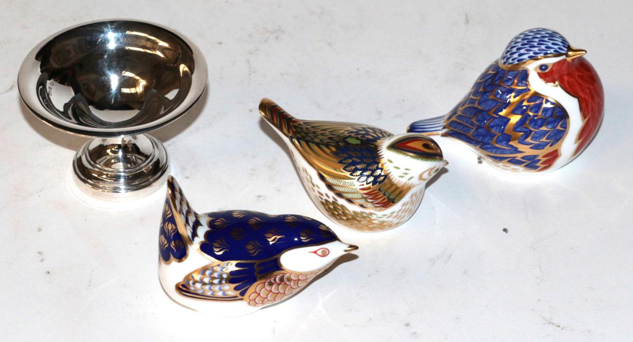 Lot 219 - Three Royal Crown Derby birds; and a small silver tazza