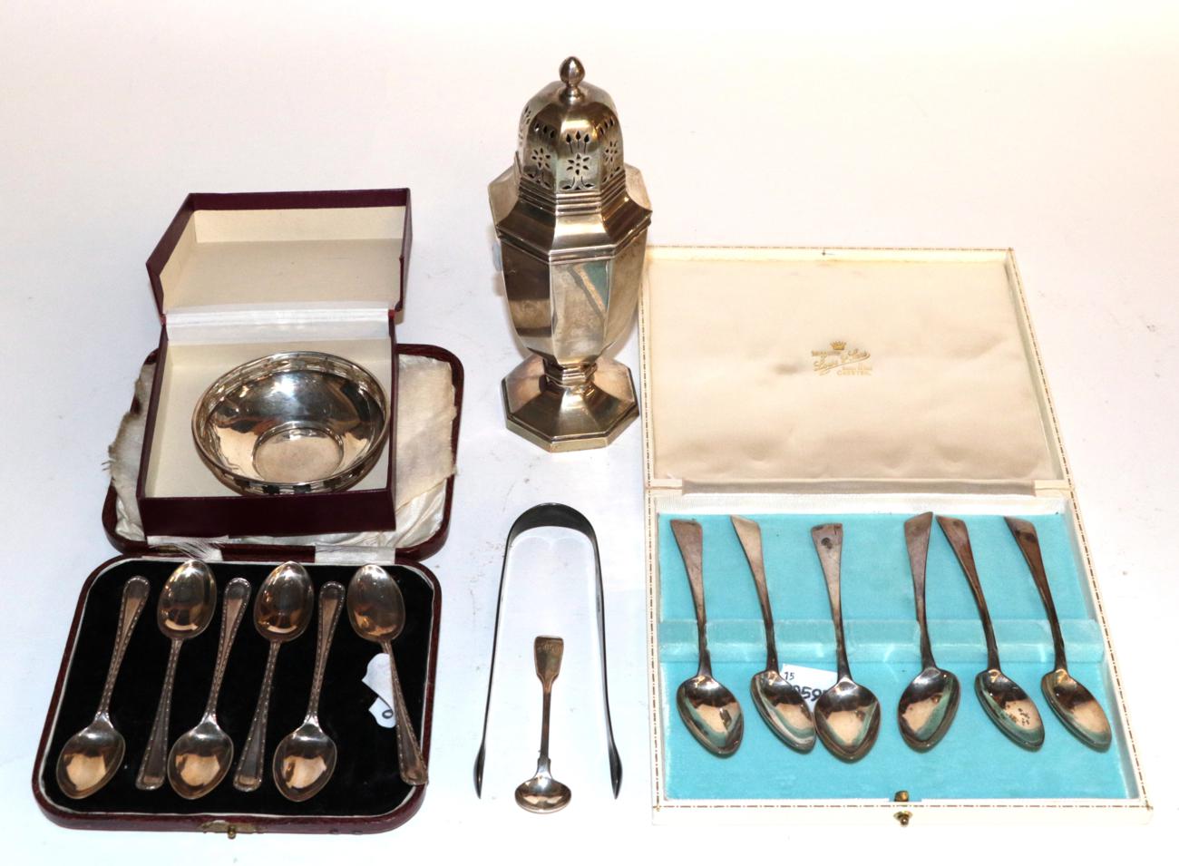 Lot 262 - A collection of silver including: a George VI silver sugar-caster, by Walker and Hall,...