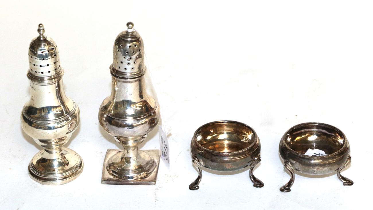 Lot 272 - A pair of George III silver salt-cellars and two George III silver pepperettes, the...