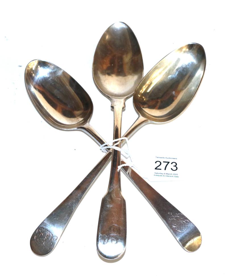 Lot 273 - Three George III silver tablespoons, two Old English pattern, engraved with differing initials,...