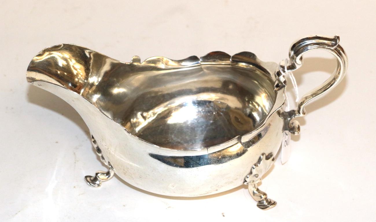 Lot 274 - A George V silver sauceboat, by William Gibson & John Lawrence Langman, London, 1896, boat...